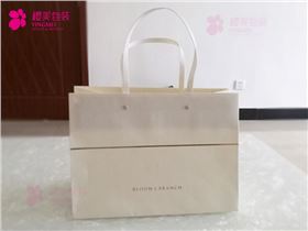 铆钉化妆品手提袋加工1.jpg
